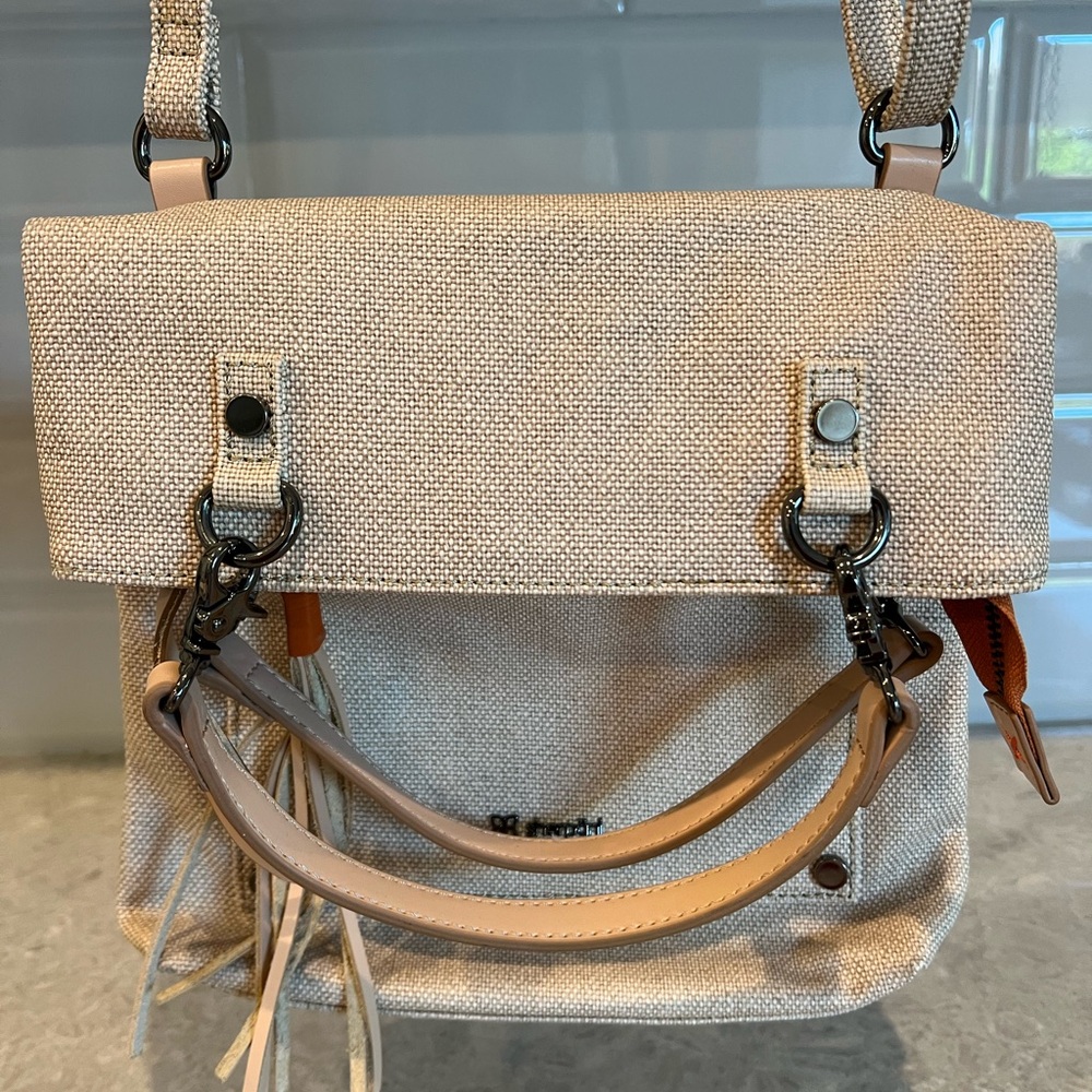 Sherpani Cream Crossbody Bag with Modern Design